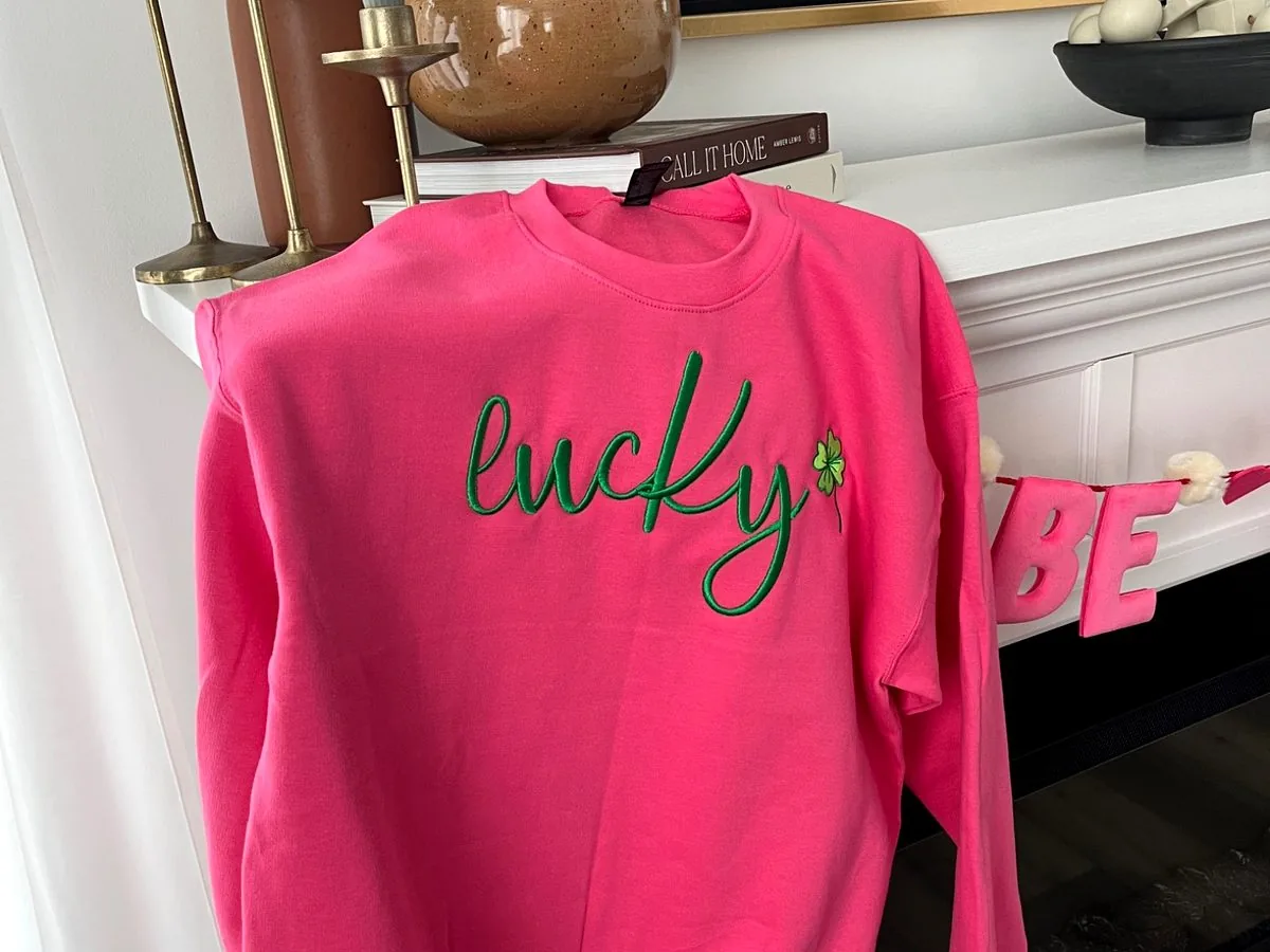Pink Lucky embroidered sweatshirt made by Needle & Spark